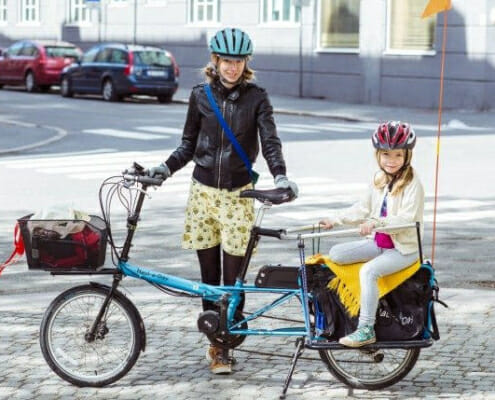 Cargo e-bike carrying child (courtesy Bike Friday)