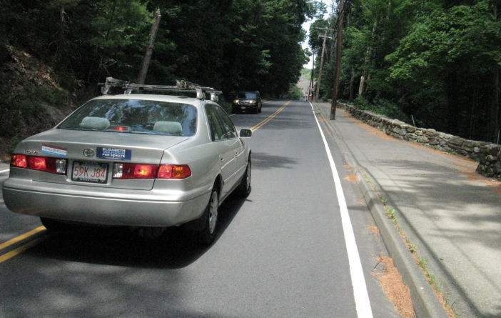Illegal turns: drivers wait for bicyclists to pass on the right.