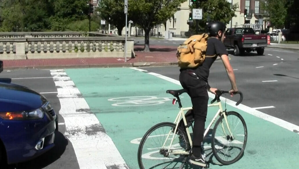 A bike box invites bicyclists to swerve out in front of motor vehicles.