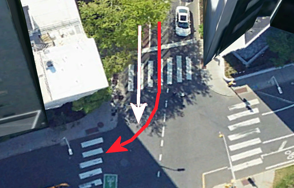 Manufactured conflict creates vulnerable road users: a bicycle turning right on red right hooks another going straight on a vertical bar