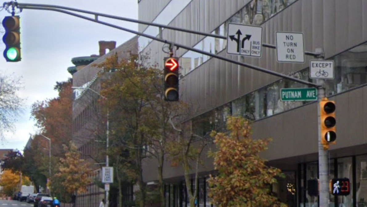 Signs and signals at Mt. Auburn street and Putnam Avenue